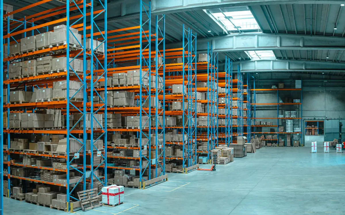 A large logistics warehouse with tall storage racks